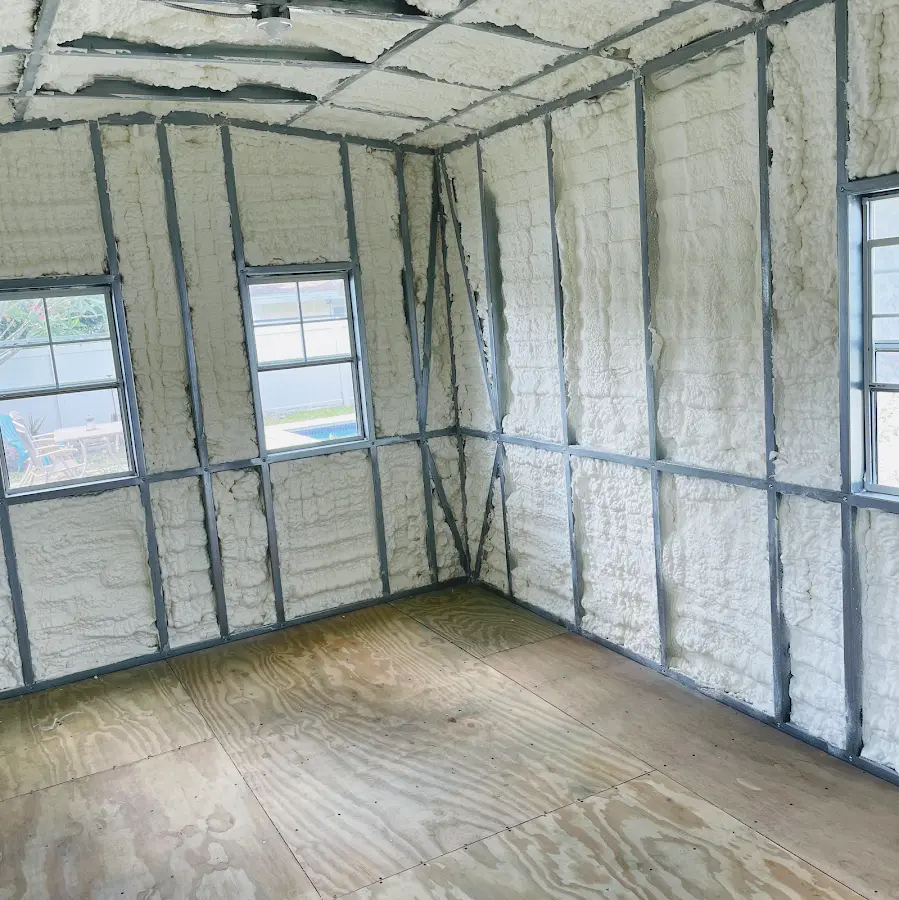 Closed-cell spray foam insulation applied to wall cavities in a residential project in Dallas